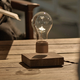 Illustration for article titled It's No Hoverboard, But This Levitating Light Bulb Is Still a Neat Trick
